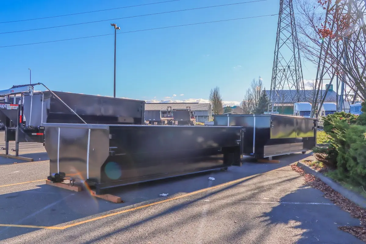 Roll-off dumpster ready for waste disposal at job site for Concrete Dumpster Rental in Satsuma